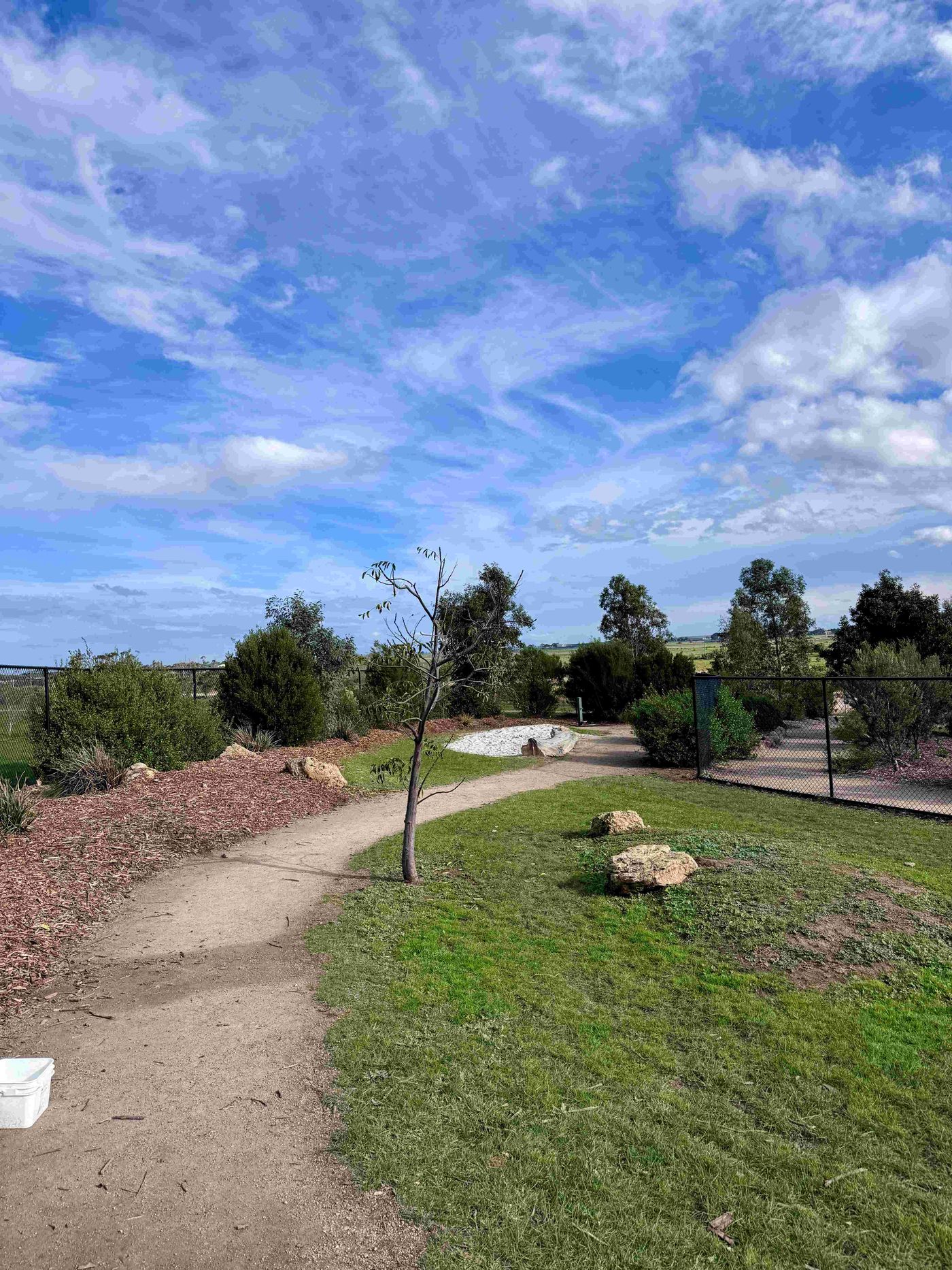Passive dog area path with native gardens at Lara Dog Park