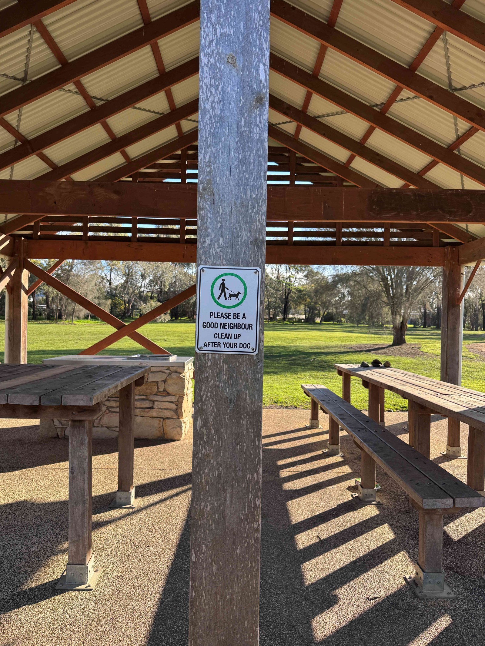 Shelter with clean up after your dog signage at Newling Reserve