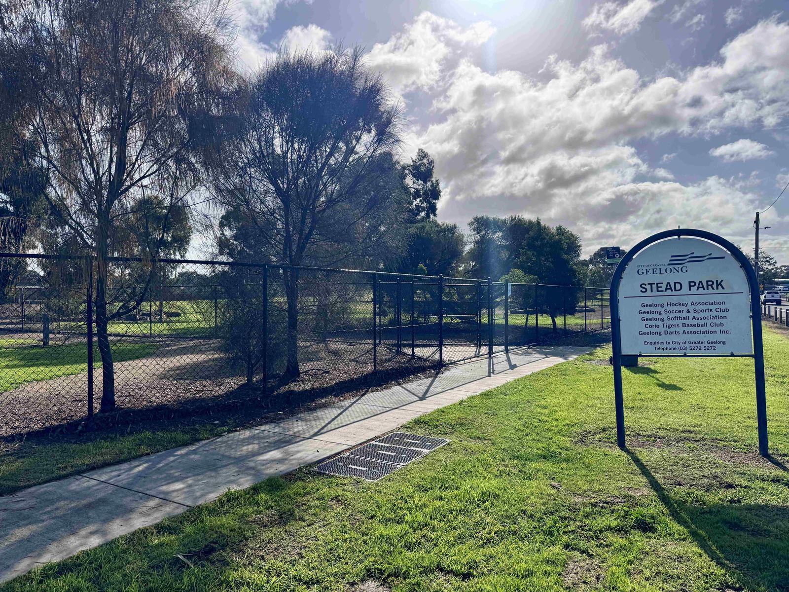 Entry path and fencing at the passive area of Stead Park Dog Park